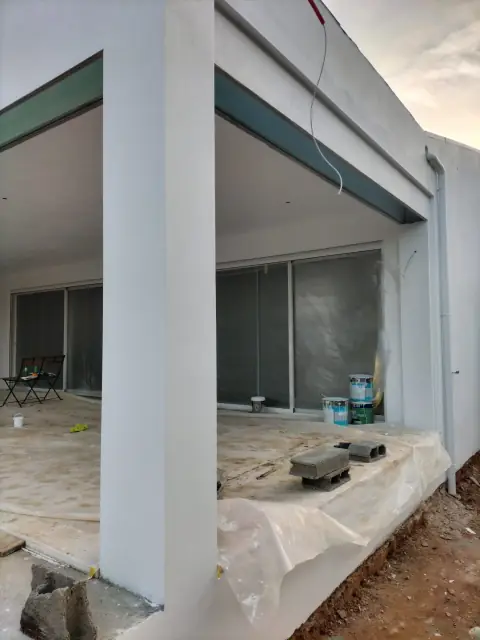 Exterior painting of a villa with a veranda — photograph 10