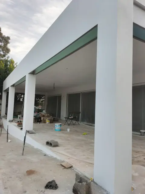 Exterior painting of a villa with a veranda — photograph 15